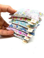 An assortment of six bright Liberty of London lavender bags