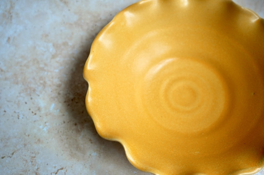 Ruffle edged ceramic bowl