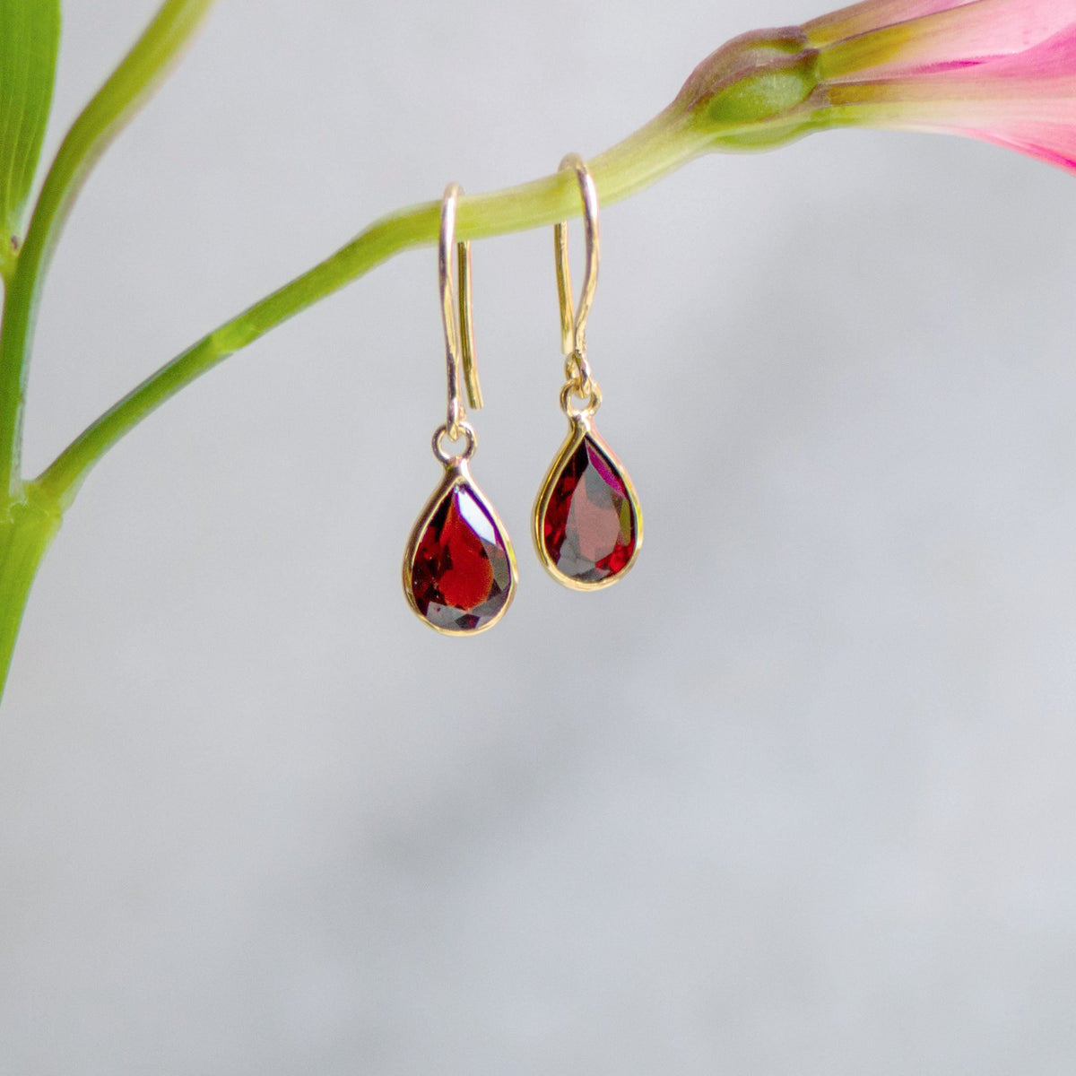 Tear Drop Earrings in Gold with Garnet