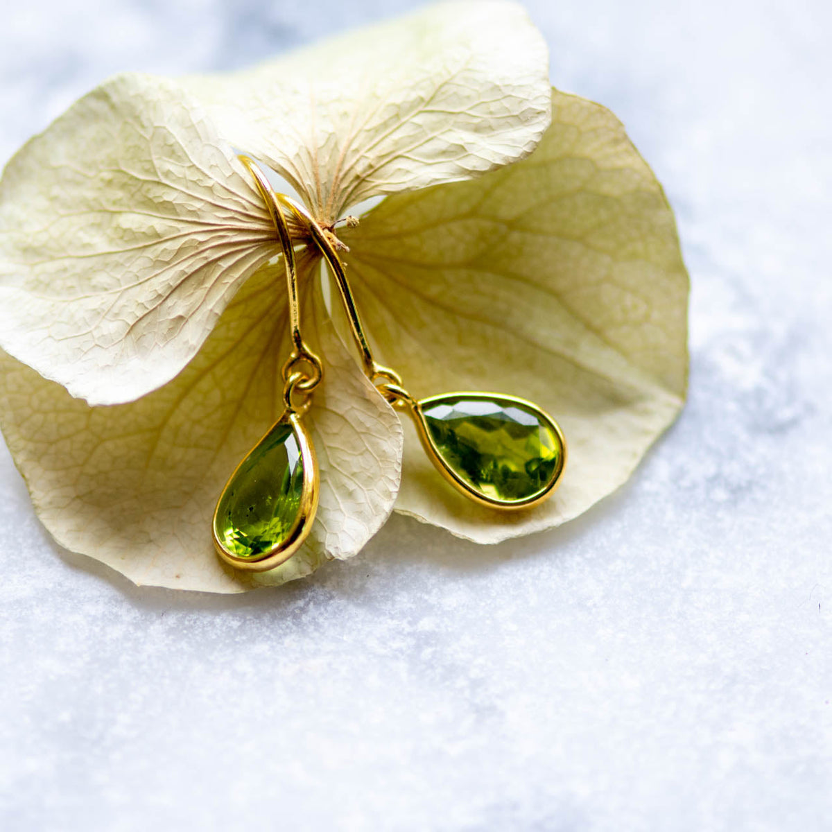 Tear Drop Earrings in Gold with Peridot