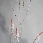 The Y Drop Necklace in Gold and Zirconia