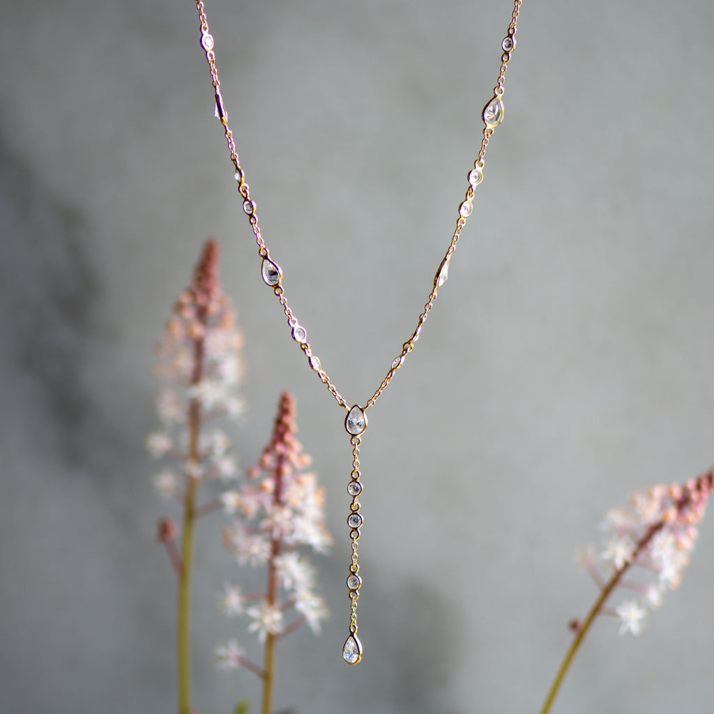 The Y Drop Necklace in Gold and Zirconia