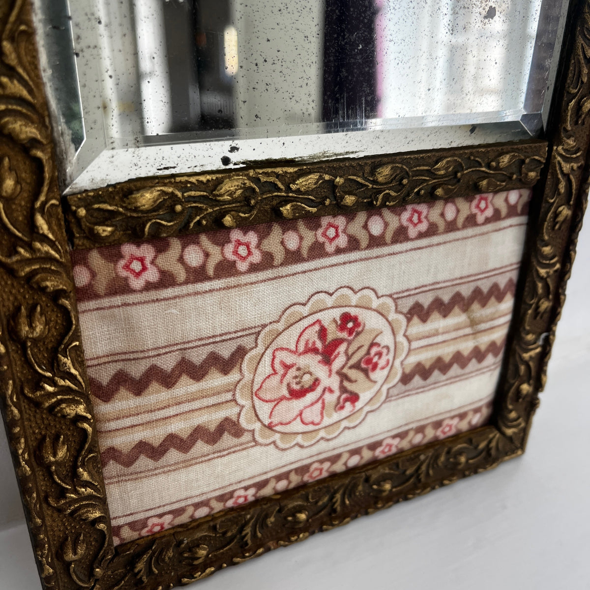 Vintage French Decorative Mirror featuring Carved Gilt Wood and Floral Fabric Panels