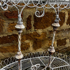 A Vintage Two-Tiered French Wirework Plant Stand with Ornate Detailing