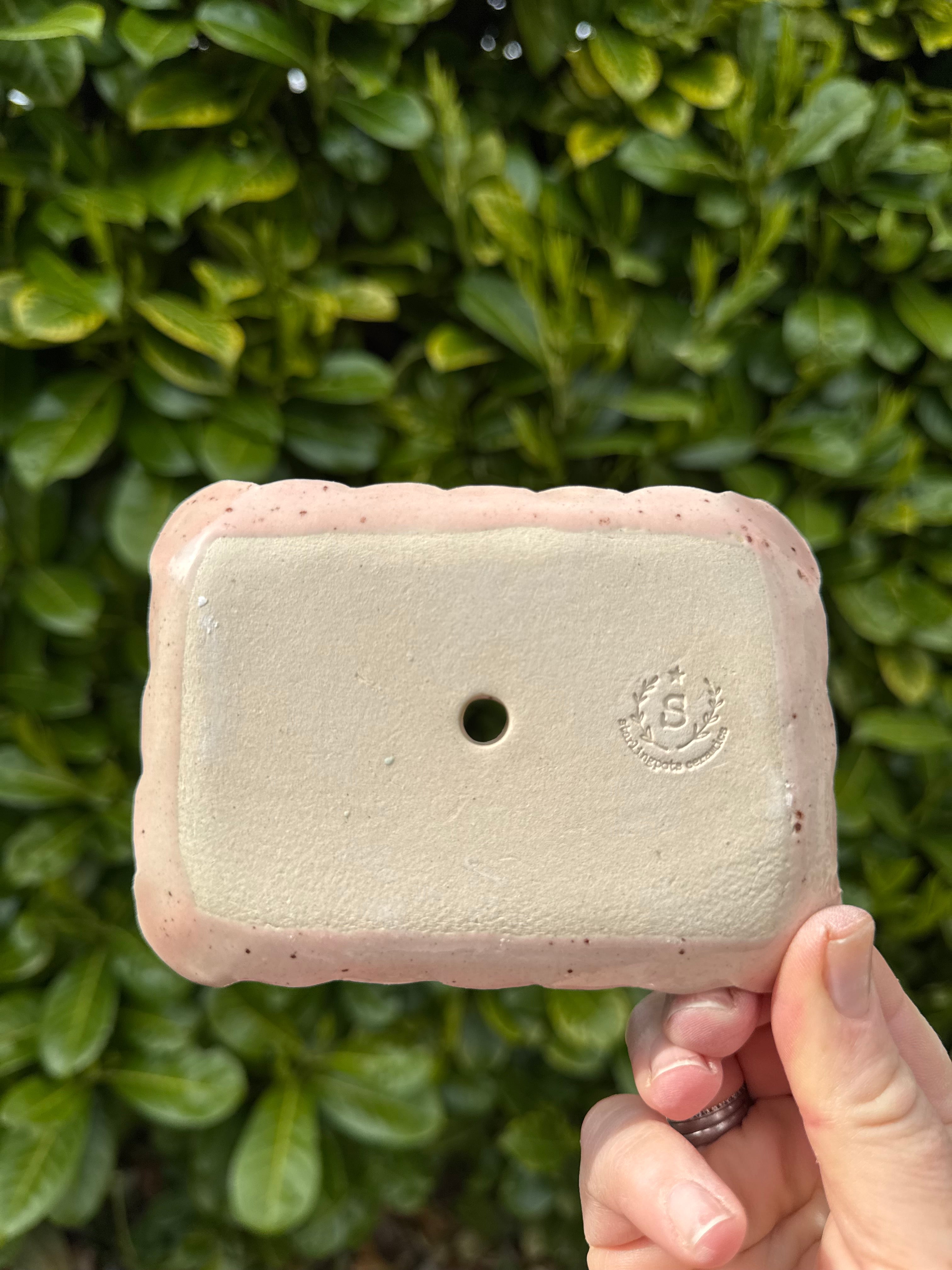 Rectangular scalloped edged soap dish with drainage hole