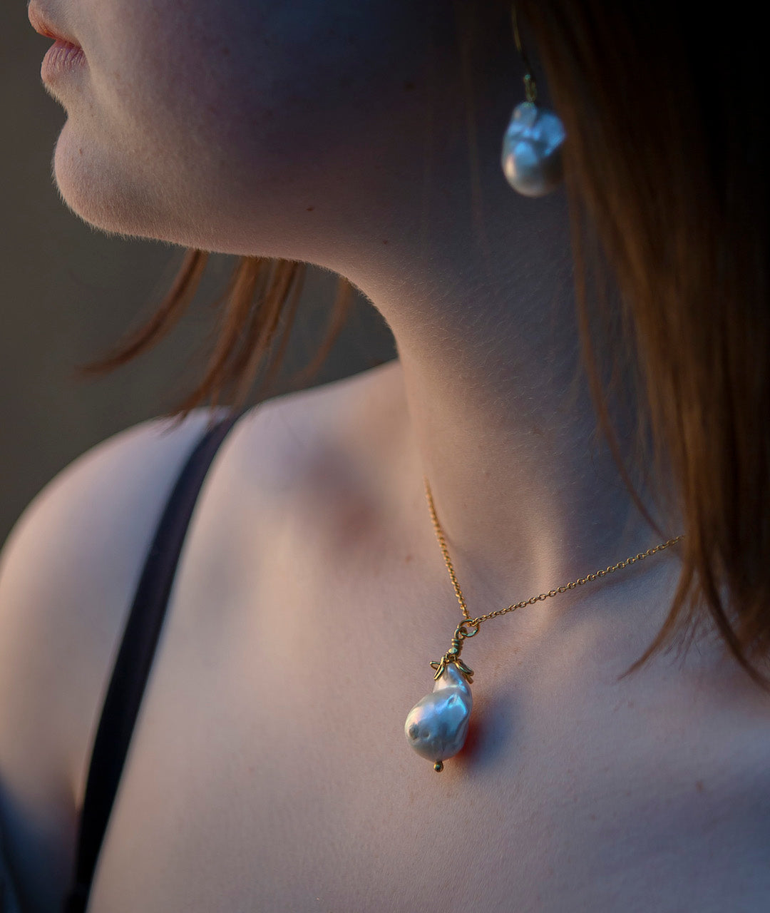 Baroque pearl and uncut diamond pendant