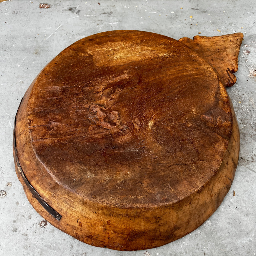 Rustic Hand-carved Wooden Bowl with a Decorative Handle