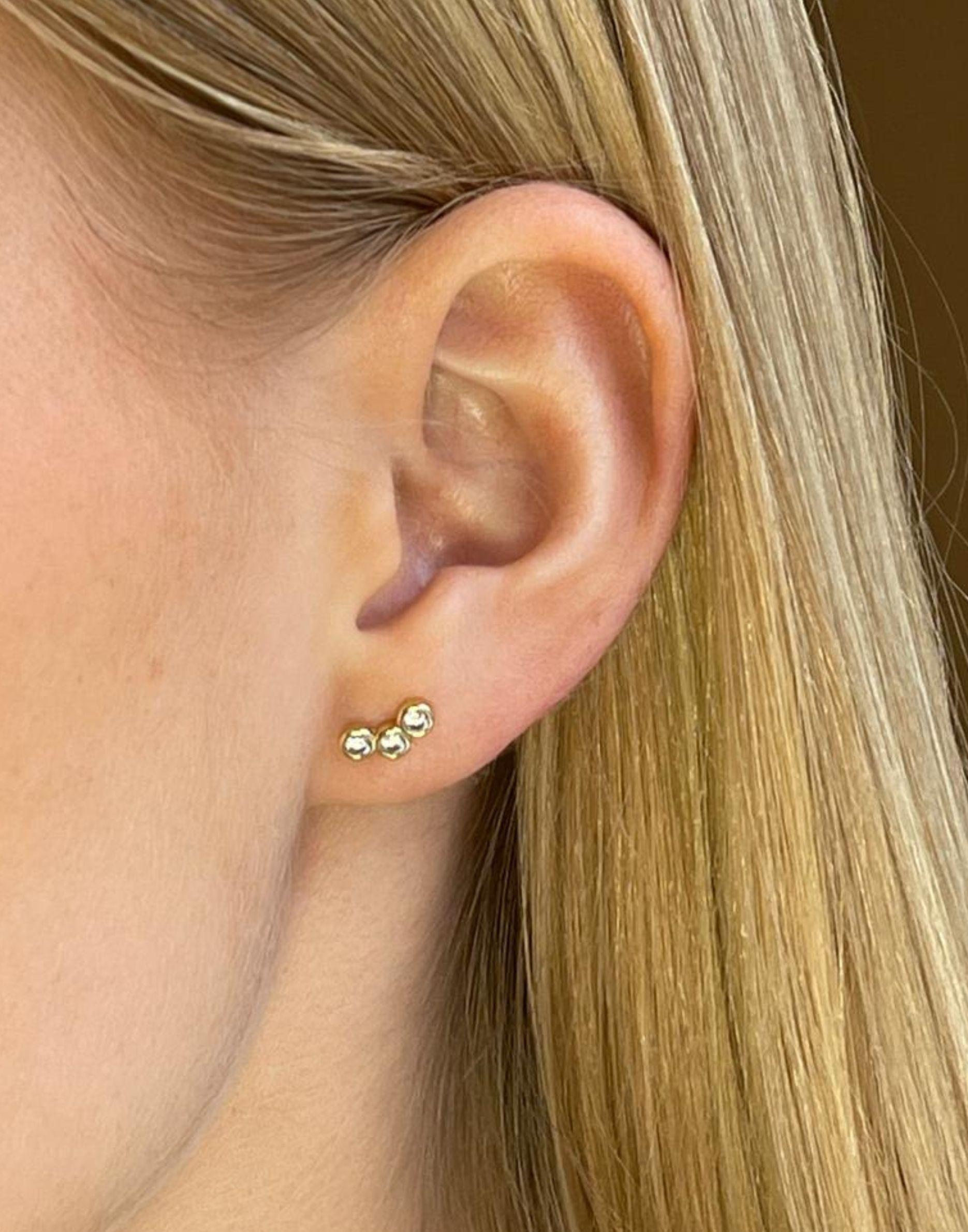 Triple Cubic Zirconia Gold Stud Earrings