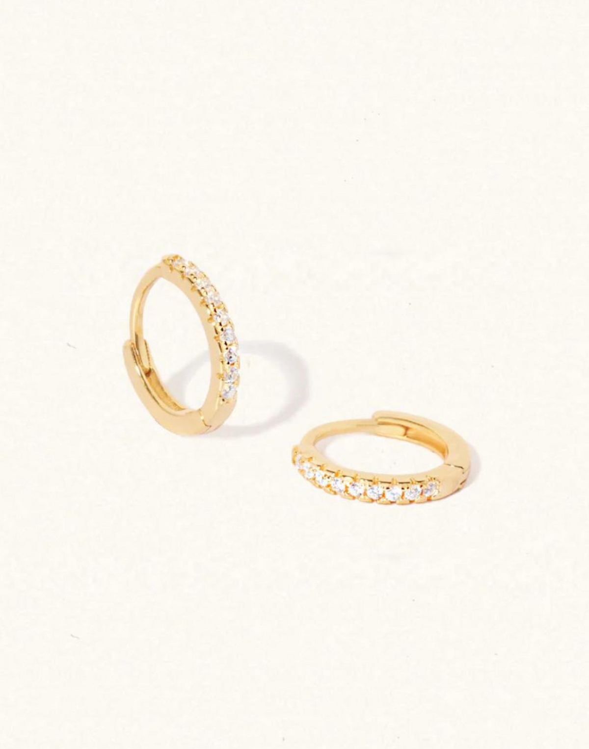 Vicky White Topaz Huggie Earrings
