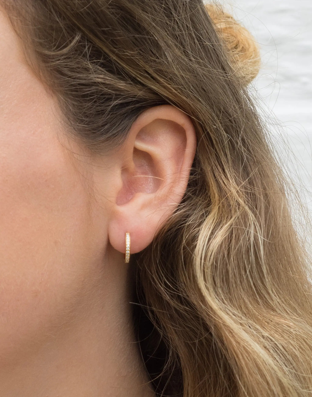Vicky White Topaz Huggie Earrings