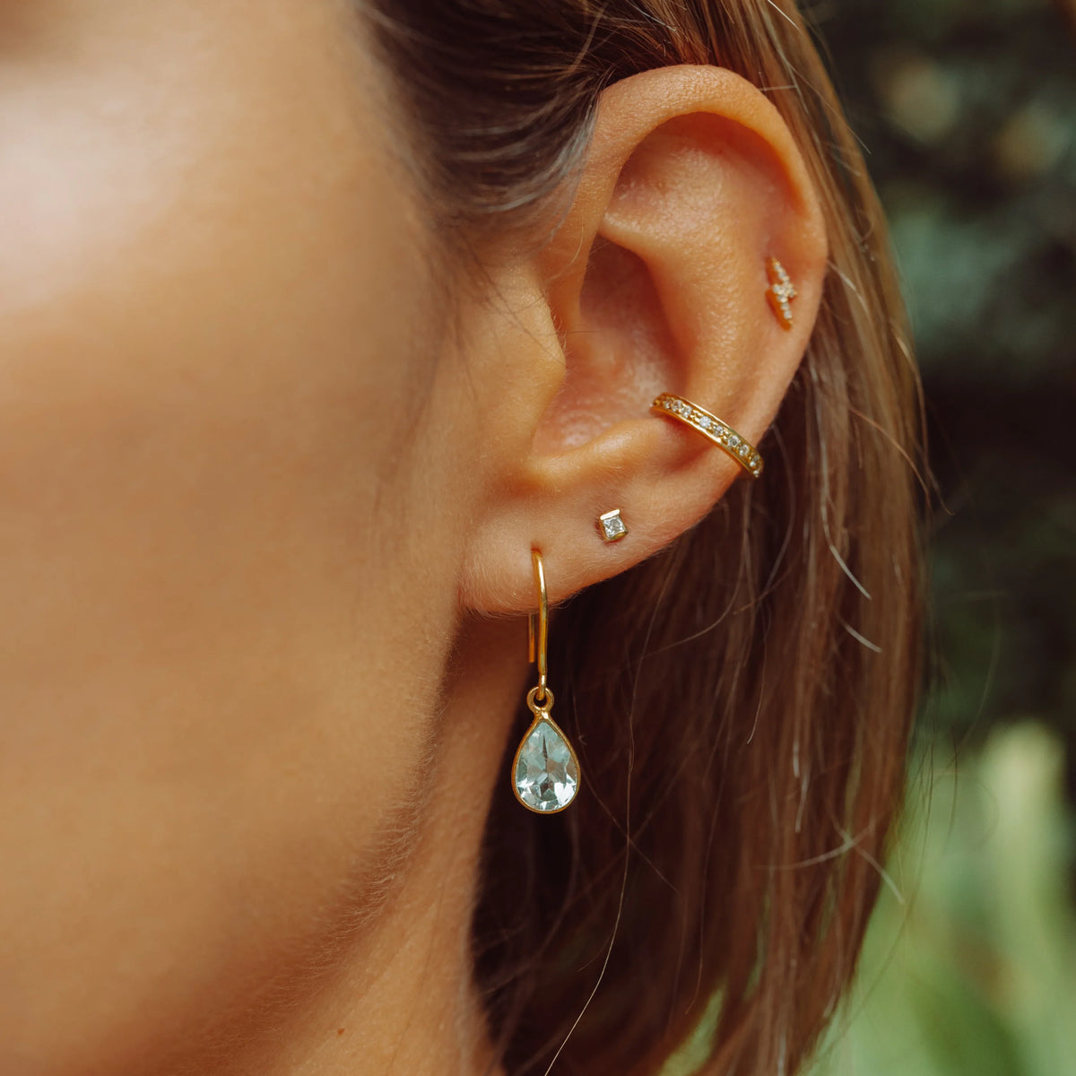 Tear Drop Earrings in Gold with Sky Blue Topaz