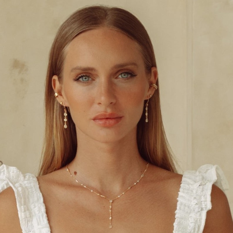 The Y Drop Necklace in Gold and Zirconia