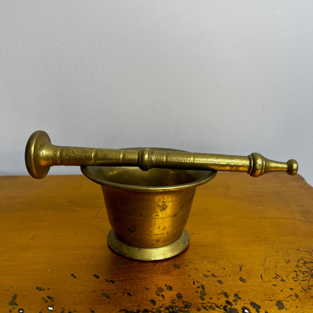 Antique Brass Mortar and Pestle on a Carved Wooden Wall Bracket