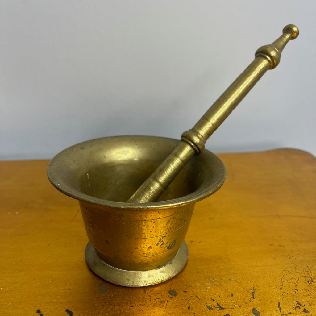 Antique Brass Mortar and Pestle on a Carved Wooden Wall Bracket