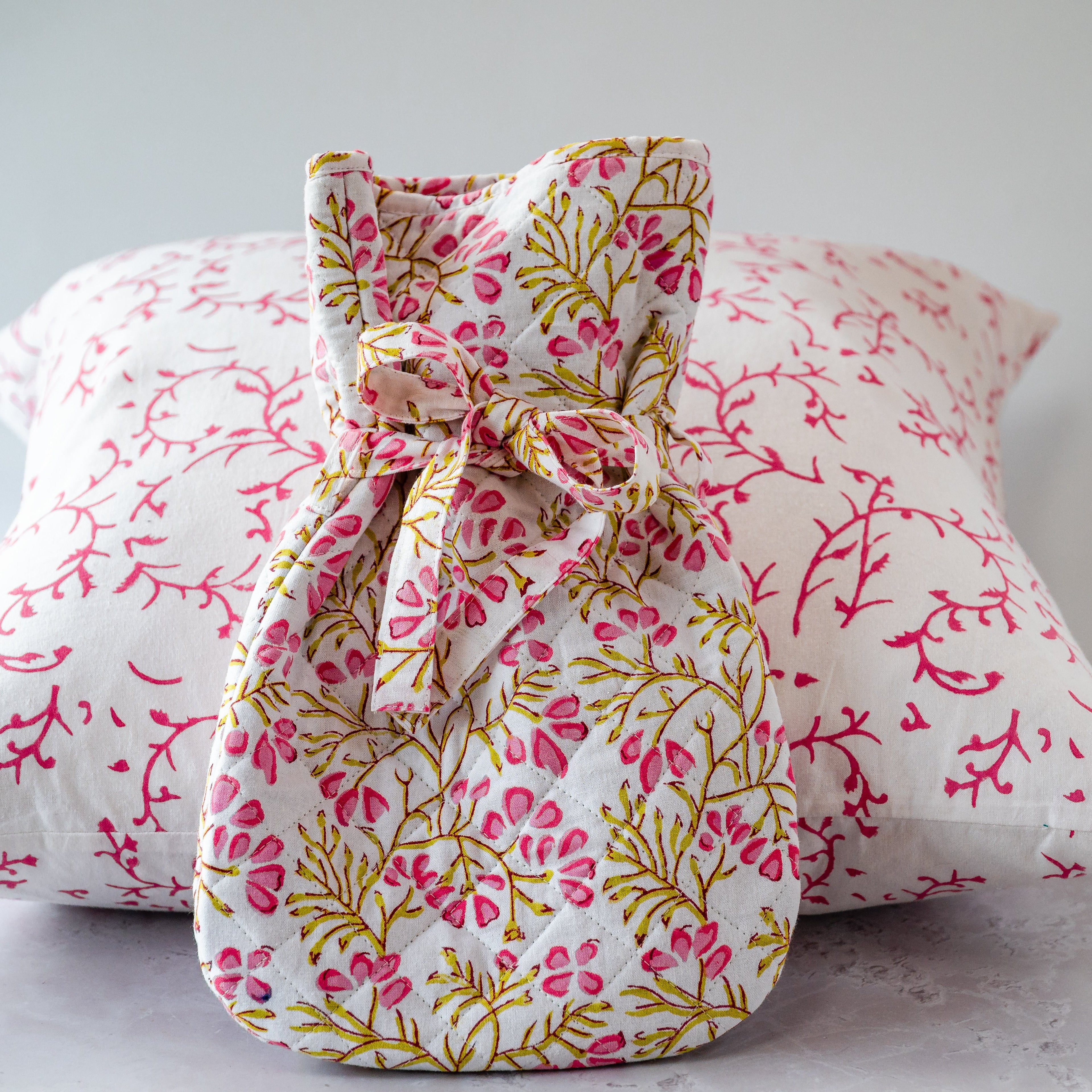 TRAILING PINK FLOWER  hot water bottle