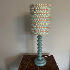 Contemporary handmade lampshade in blue and orange with a modern design