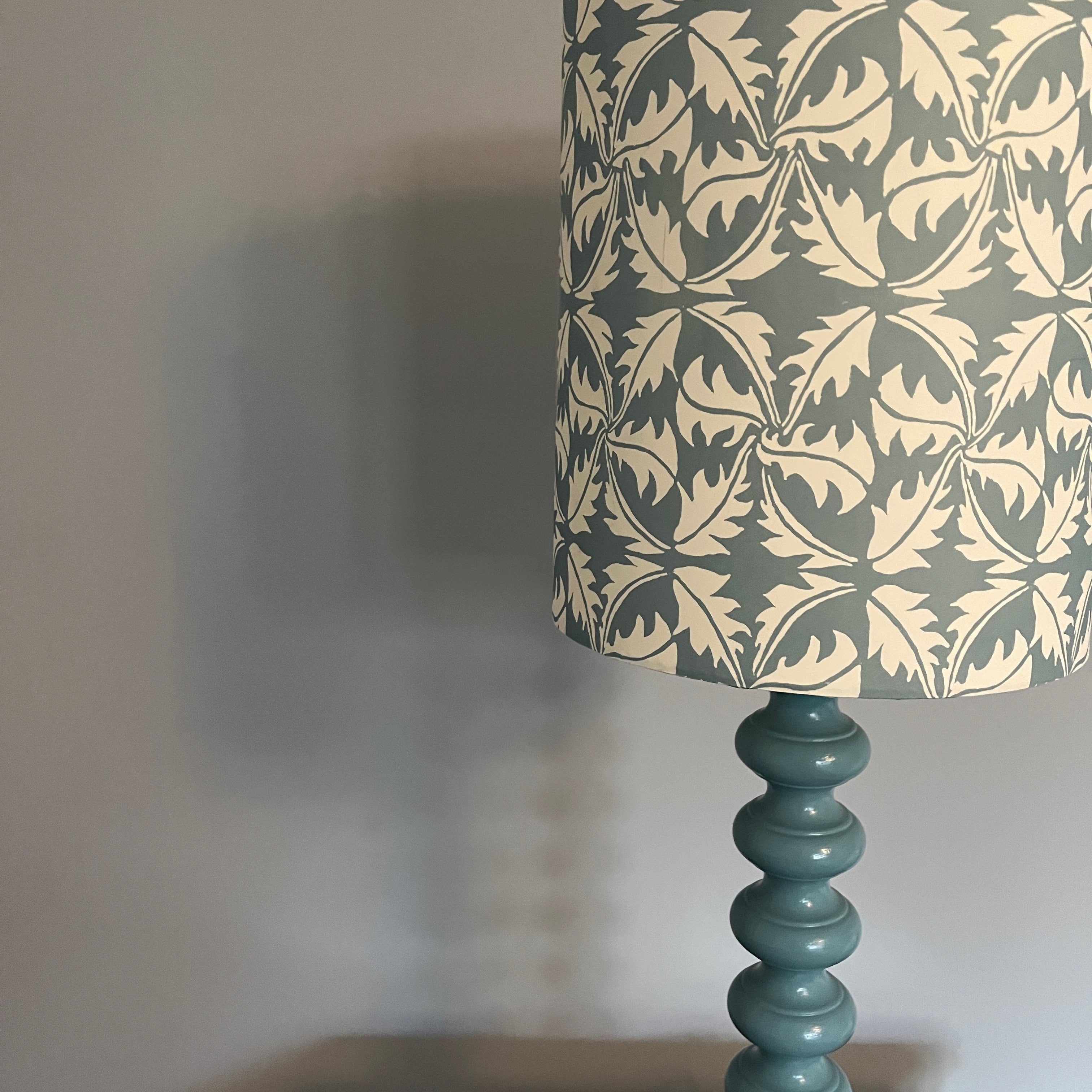 Contemporary handmade lampshade in blue and white with a modern design