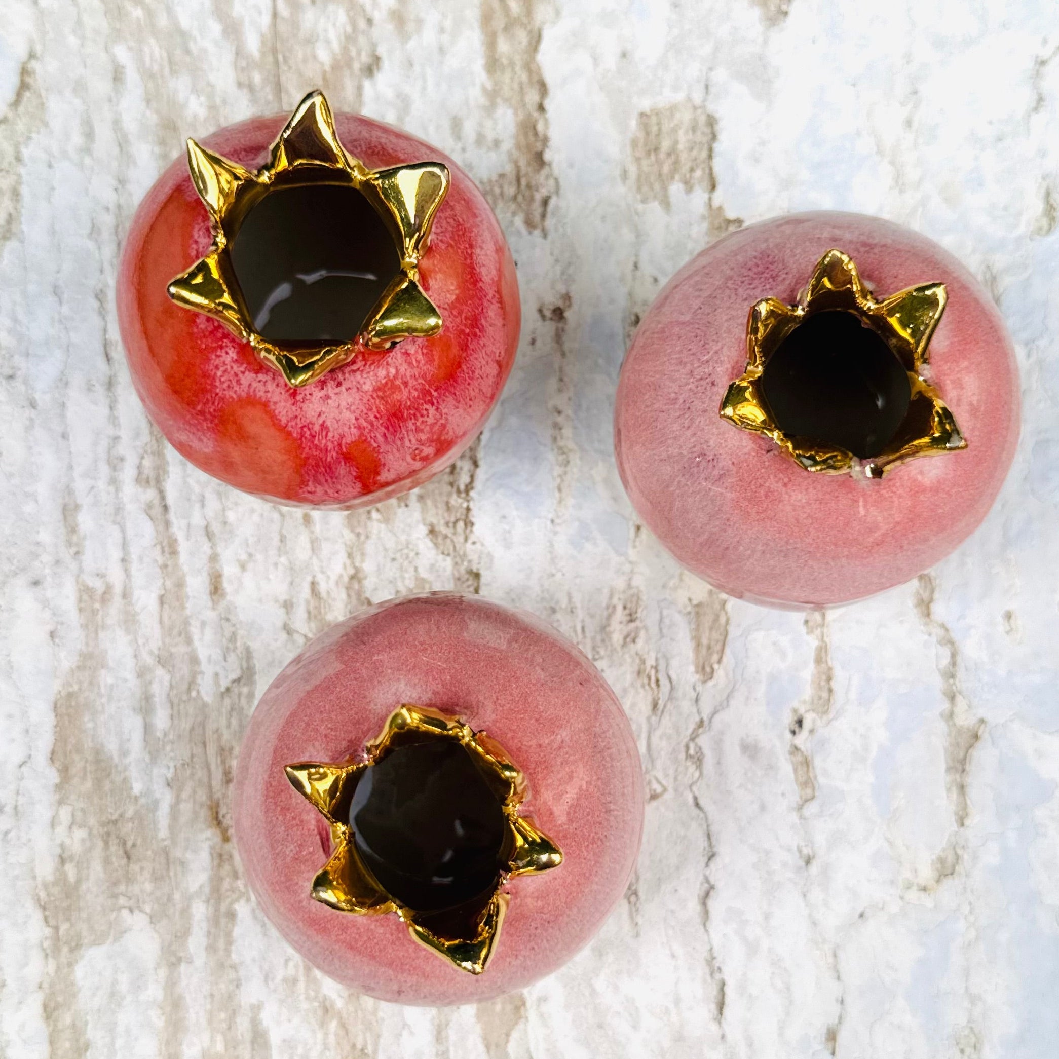 Small pomegranate vase with hot pink glaze and 24 carat gold crown detail