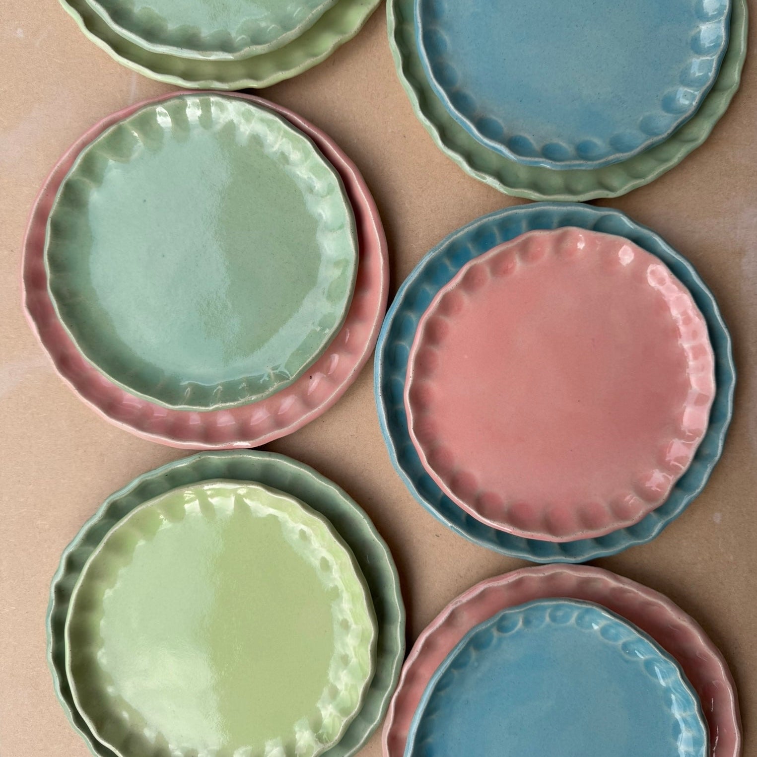 Thumbprint tea plates in french macron coloured glazes